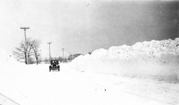 BM c1925 NJDH Belle Hammond and her son Fred Field negotiate the snow in their Essex.